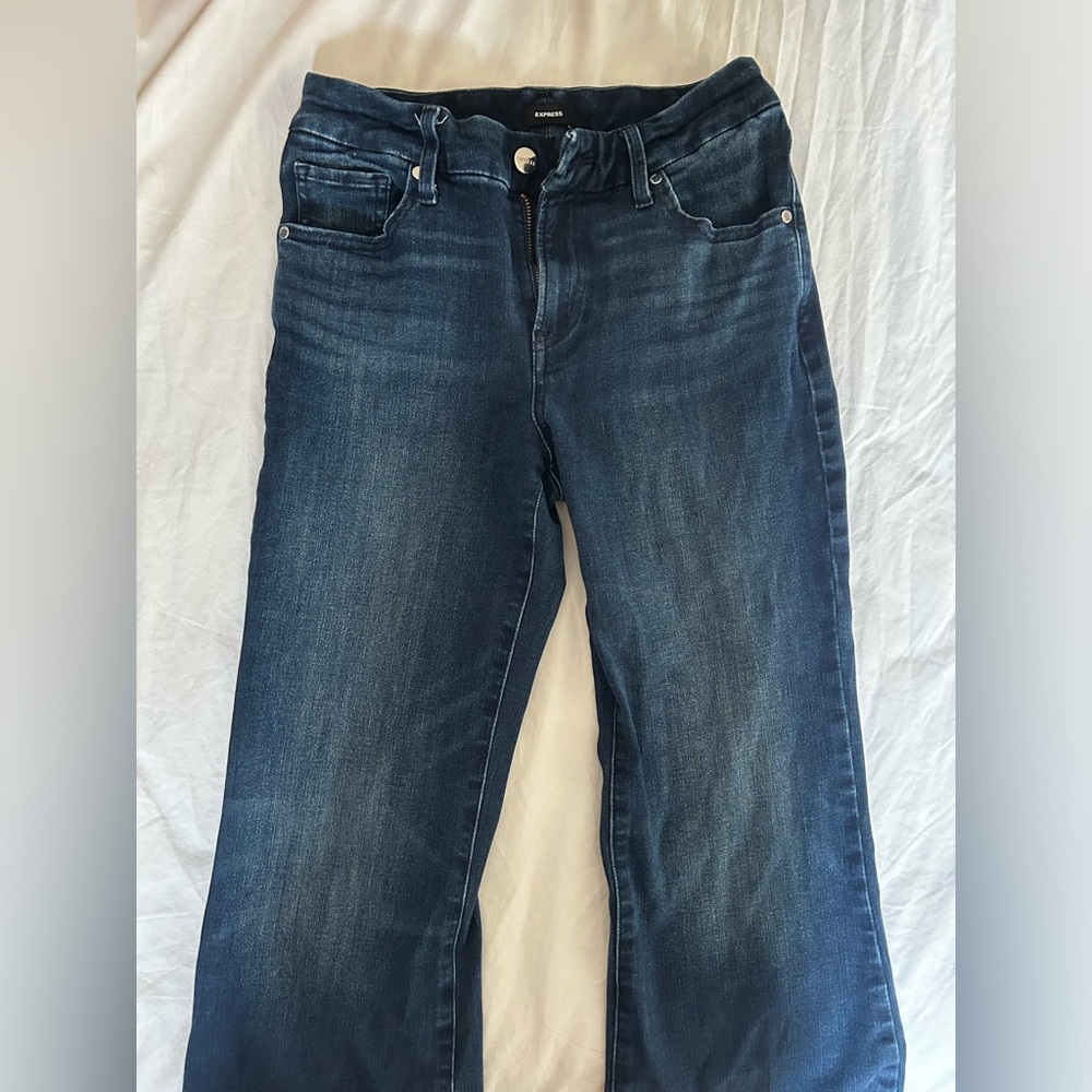 express blue mid rise flare jeans small